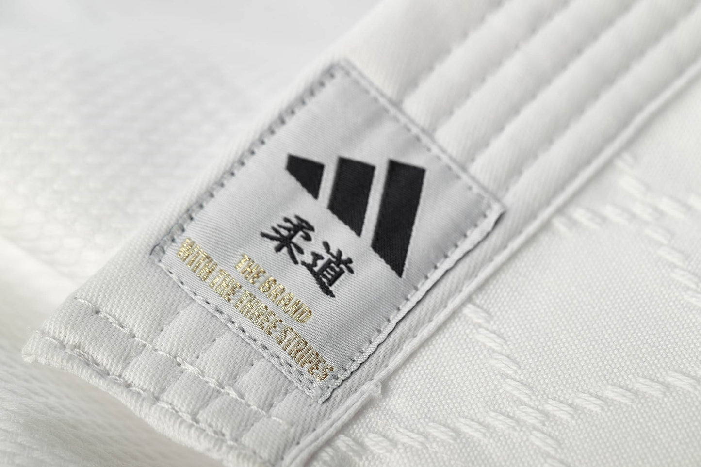 Judoanzug adidas® Club Gi J350, weiß/blau 120-180, schwarze Streifen