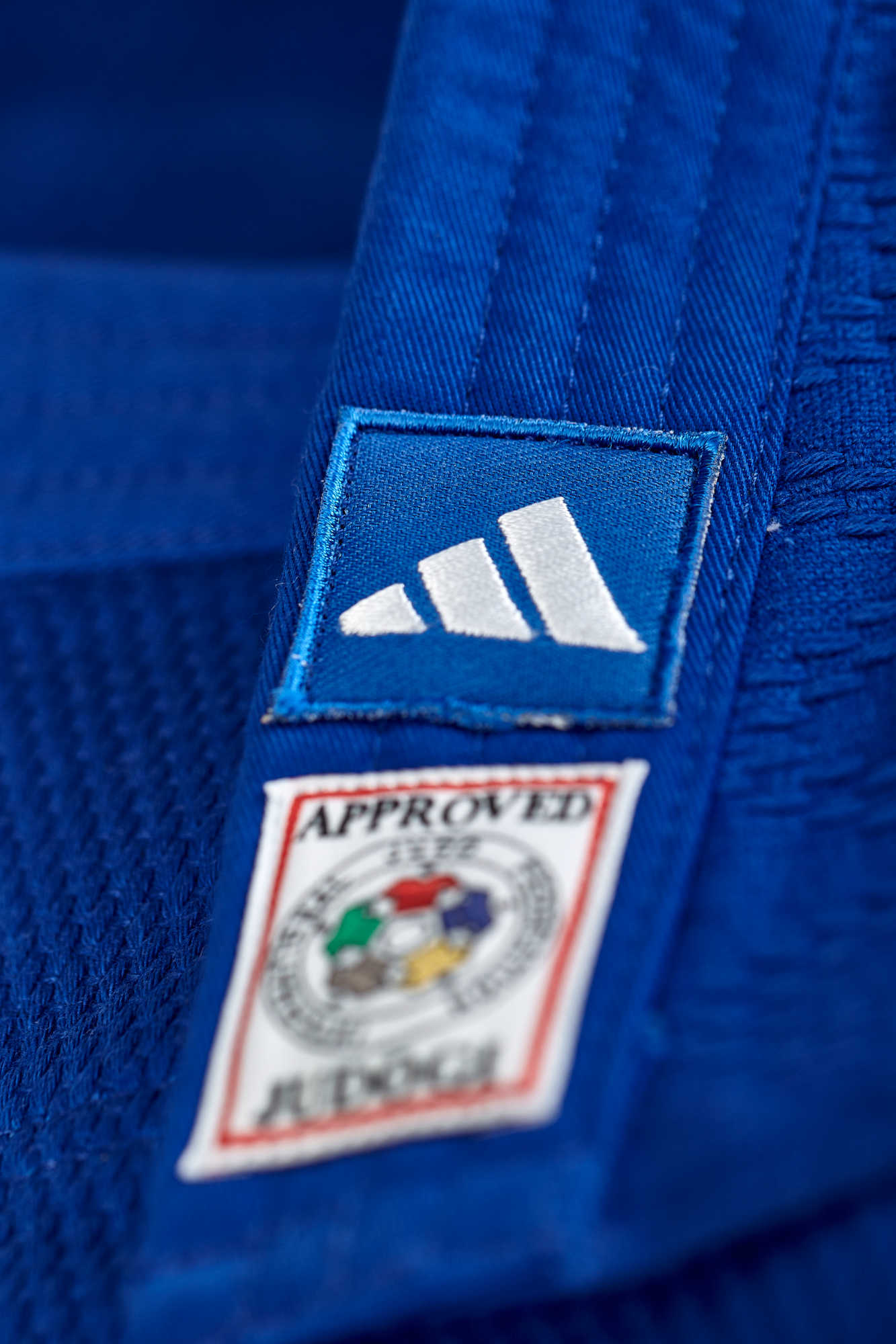IJF Judoanzug adidas® Champion III Wettkampfanzug, weiß/blau 150-200 reg/slim