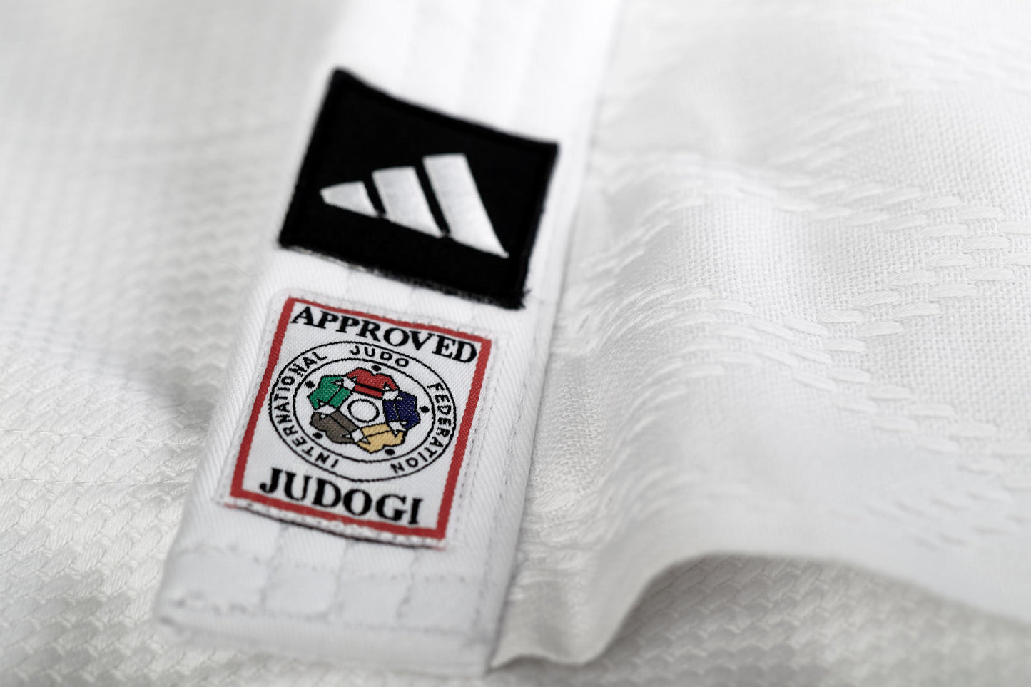 IJF Judoanzug adidas® Champion III Wettkampfanzug, weiß/blau 150-200 reg/slim